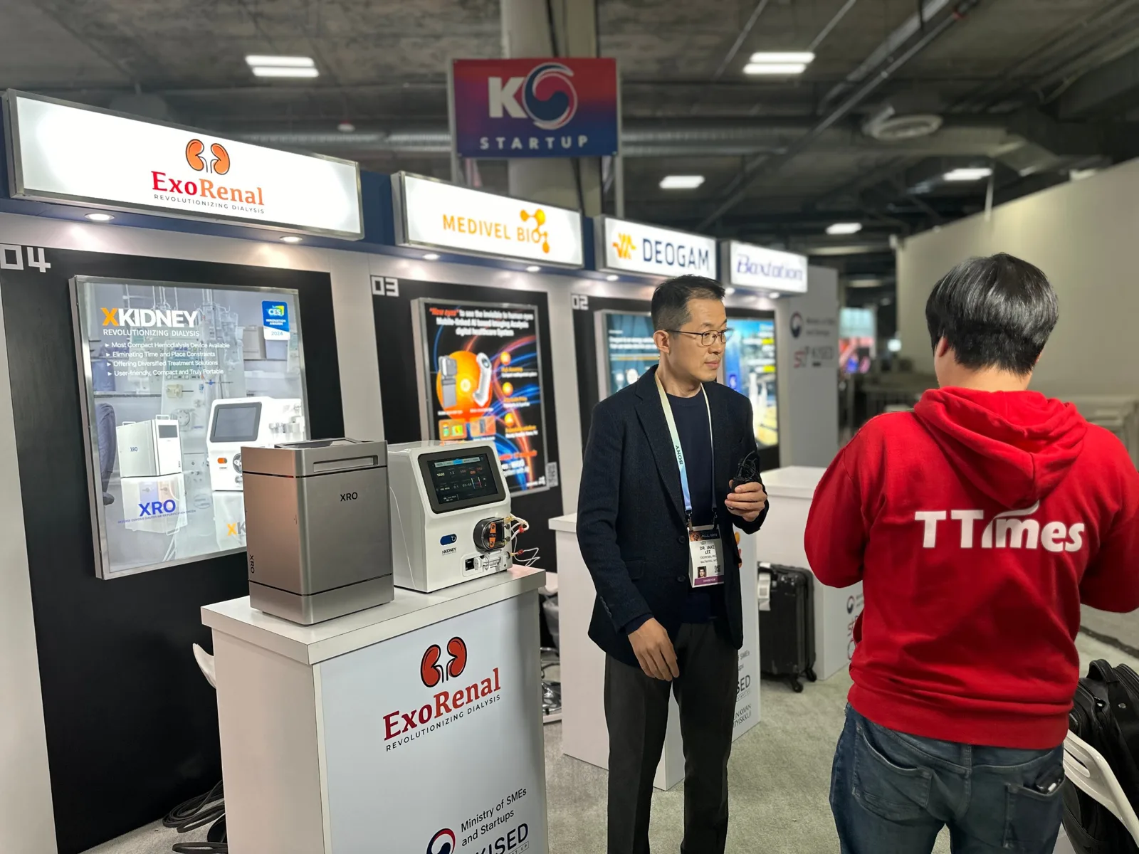 A press interview at the booth with XRO and XKIDNEY on display