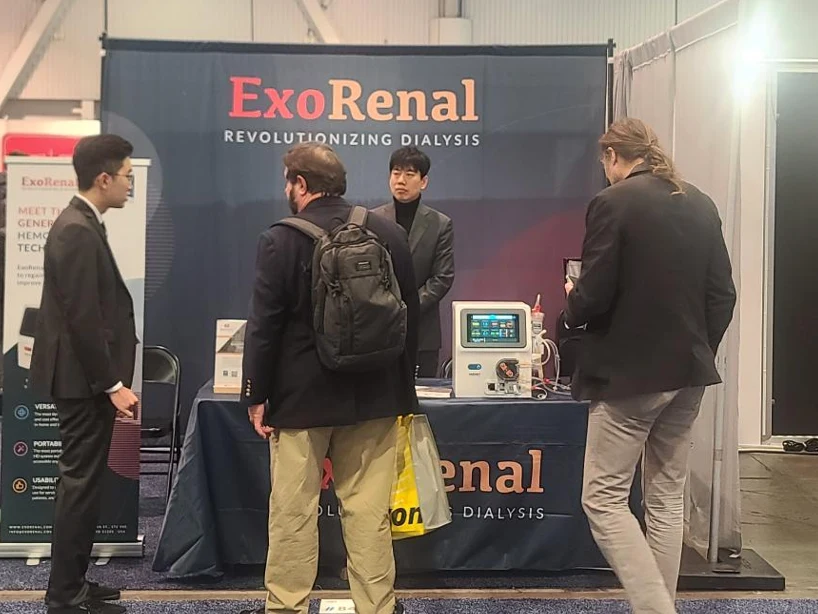 Visitors gathered around XKIDNEY at the Exorenal booth in the Digital Health hall